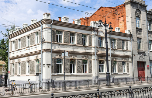 Omsk, Omsk Region, Russian Federation - June 5, 2024. Gymnasium M.V. Kaesh. Ancient houses on Lenin Street