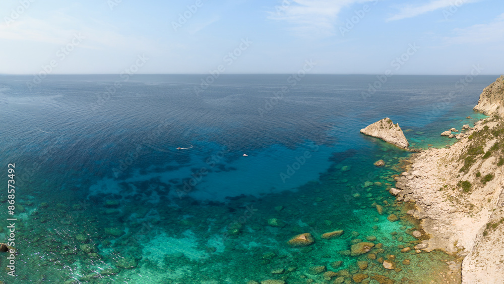 Aerial view on clear turquoise blue water on small Kastelli beach on Corfu island. Aerial view on clear turquoise blue water on small Kastelli beach on Corfu island.