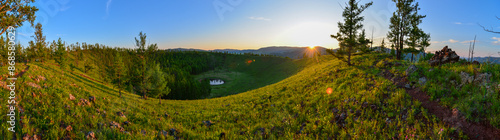 Crater of Uran Togoo volcano during sunset photo