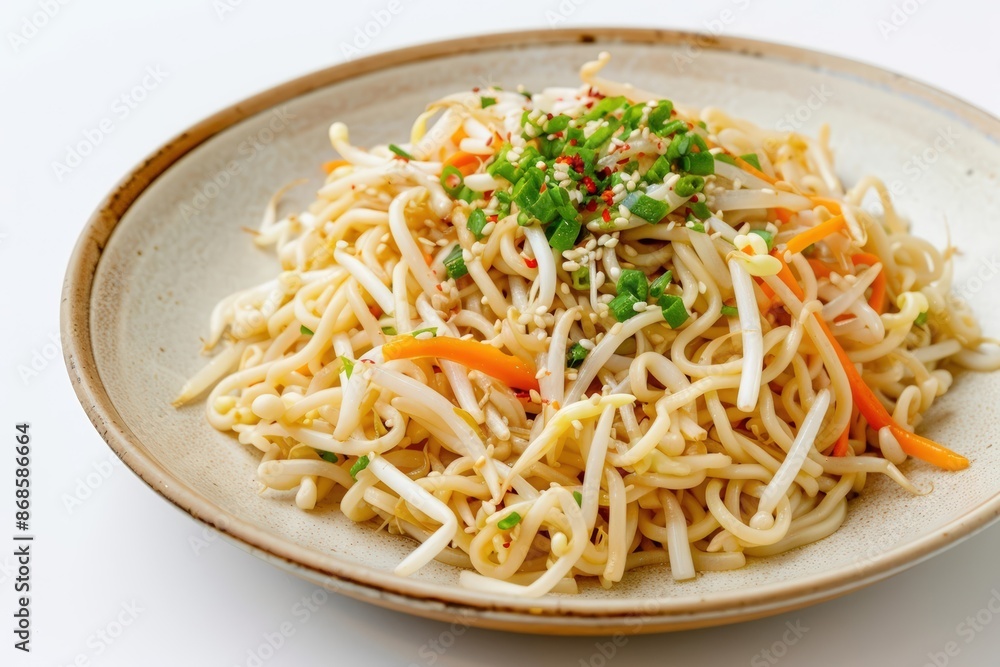 Elegant Plated Dan Dan Sesame Noodles with Fresh Vegetables and Nutty Dressing Elegant Plated Dan Dan Sesame Noodles with Fresh Vegetables and Nutty Dressing