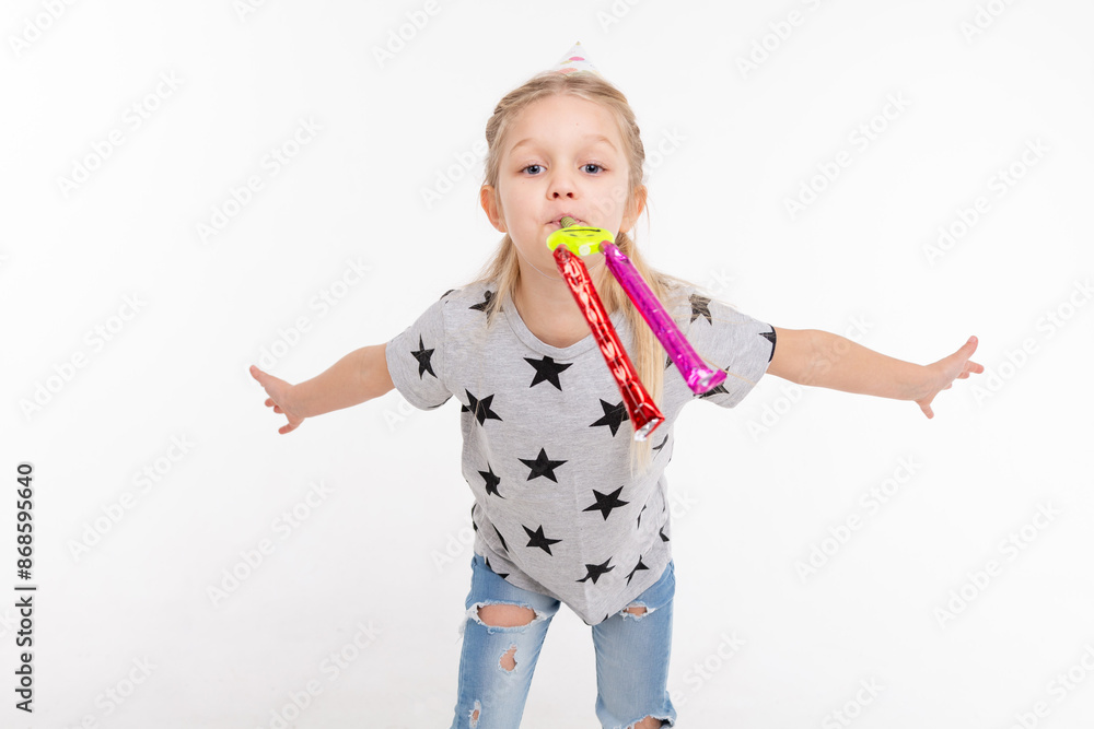 happy little girl with gift box and birthday cone super happy and smiley on white background with copy space happy little girl with gift box and birthday cone super happy and smiley on white background with copy space