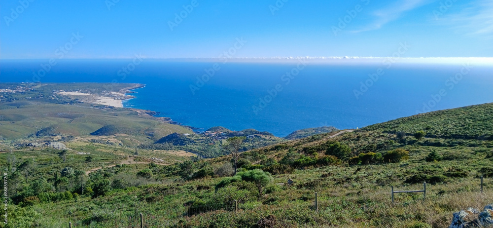 Hiking trail overlooking the atlantic ocean in sintra cascais natural park portugal Hiking trail overlooking the atlantic ocean in sintra cascais natural park portugal