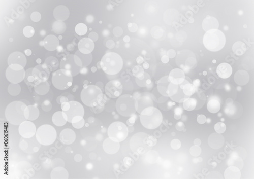 Gray and white gradient abstract backgrounds combined with blurred circles, dots and bokeh can be used in media design. Website banner and presentation.
