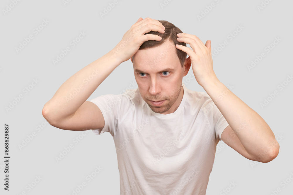 Fototapeta premium Man baldness treatment. Anti hairloss clinic test. Nature hair care procedure. Diagnostic scalp. Male person checking dermatology skin. Home routine. Trichologist cosmetic