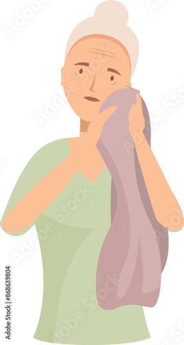 Senior woman wiping her face with a towel after taking a shower