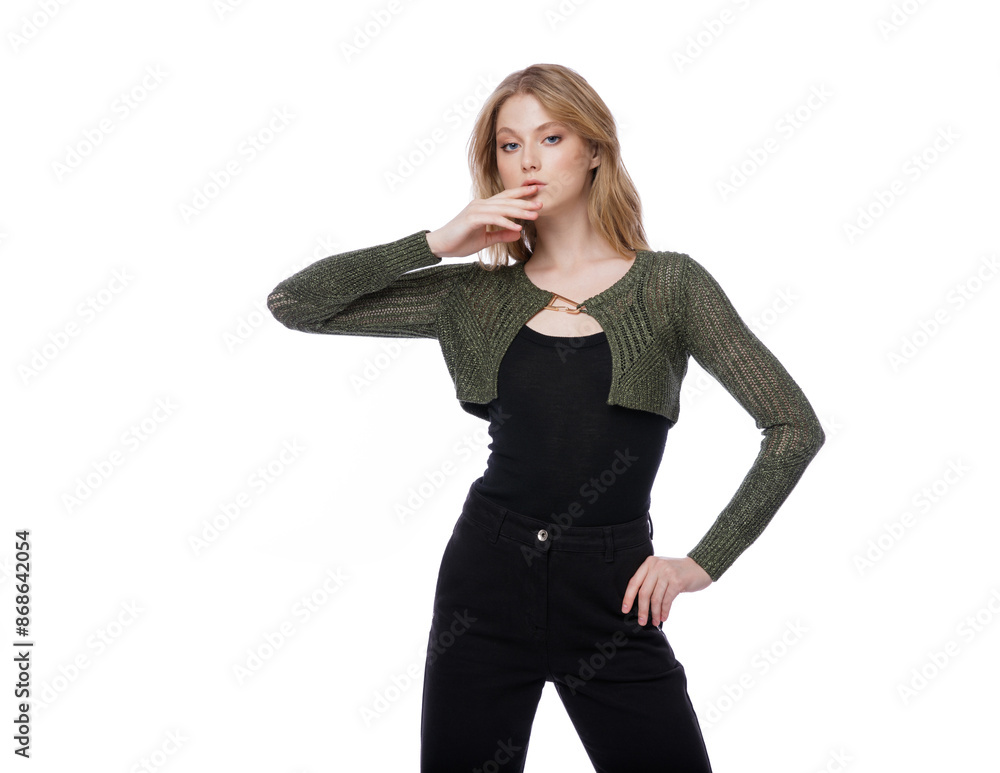 High fashion photo of a beautiful elegant young woman in pretty black denim pants, trousers, top, green short jacket posing on white background. Slim figure. Blonde High fashion photo of a beautiful elegant young woman in pretty black denim pants, trousers, top, green short jacket posing on white background. Slim figure. Blonde