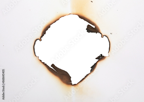 Burnt hole of paper, texture and background, clipping path	 photo