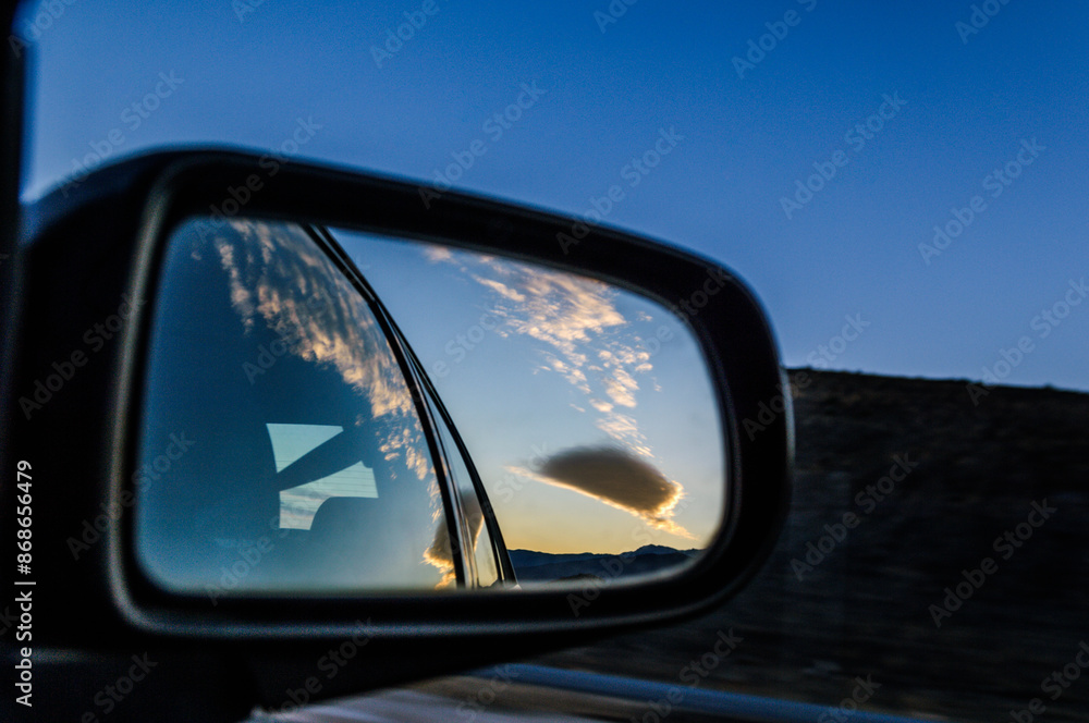 Sunset behind the rearview mirror of a car, Almeria, Andalusia, Spain, Europe Sunset behind the rearview mirror of a car, Almeria, Andalusia, Spain, Europe