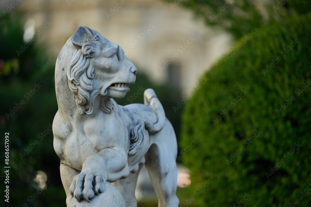 Sculpture of a lion in the Jardines de la Lonja, Sevilla, Andalusia, Spain, Europe Sculpture of a lion in the Jardines de la Lonja, Sevilla, Andalusia, Spain, Europe