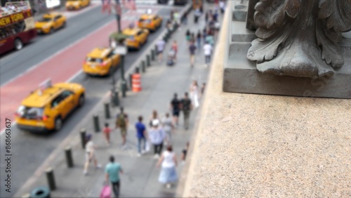 New York City Grand Central Terminal railway station, 42 street. Manhattan Midtown. Yellow taxi cab row, car transport and Pershing Square bridge, NYC, USA. American road traffic, people pedestrians.