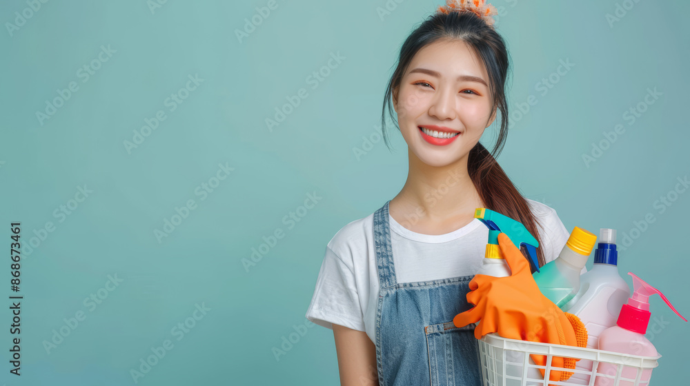 Woman Holding Cleaning Supplies Ready for Household Chores Smile. Perfect for illustrating home cleaning products, hygiene solutions, and household chores Woman Holding Cleaning Supplies Ready for Household Chores Smile. Perfect for illustrating home cleaning products, hygiene solutions, and household chores
