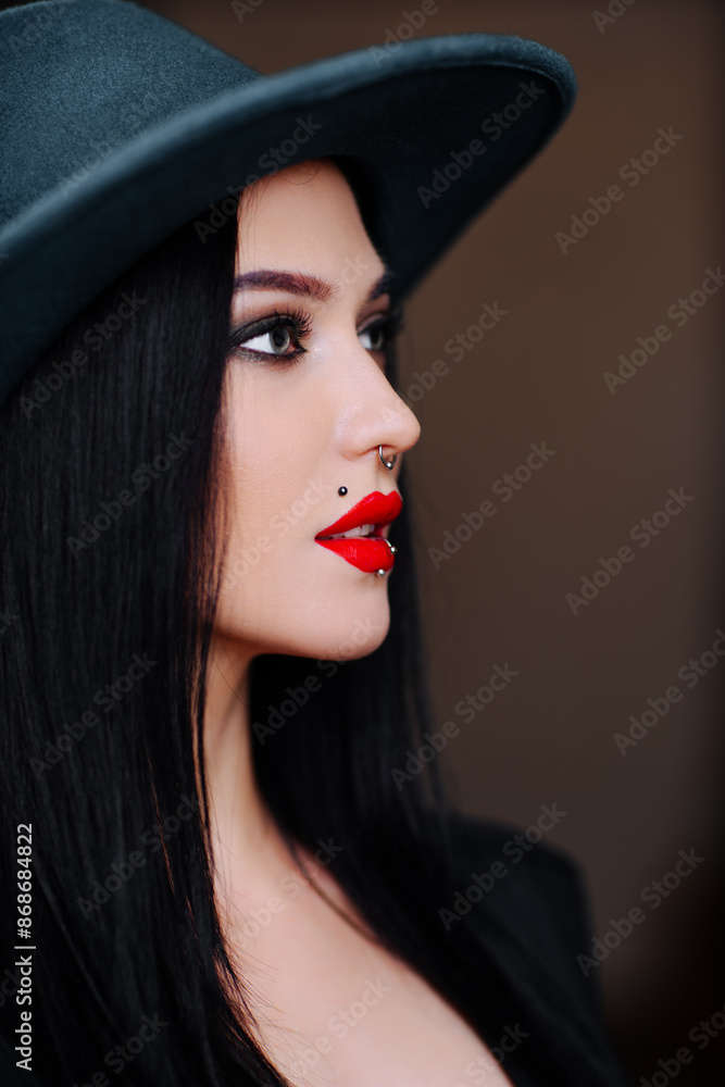 Young elegant brunette woman in hat portrait Young elegant brunette woman in hat portrait