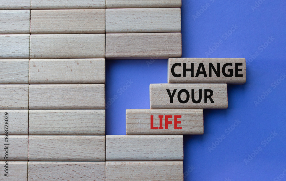 Change your Life symbol. Wooden blocks with words Change your Life. Beautiful purple background. Business and Change your Life concept. Copy space. Change your Life symbol. Wooden blocks with words Change your Life. Beautiful purple background. Business and Change your Life concept. Copy space.