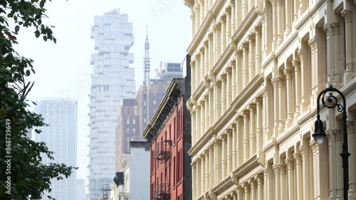 New York City Manhattan Soho fashion district near Broadway street. USA urban building facade, old american architecture. Shopping in NYC, United States. Business and residential real estate. Lantern