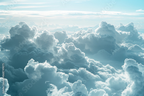 Aerial View of Clouds from Above on a Bright Sunny Day, Perfect for Capturing the Beauty of the Sky