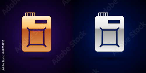 Gold and silver Canister for motor machine oil icon isolated on black background. Oil gallon. Oil change service and repair. Engine oil sign. Vector