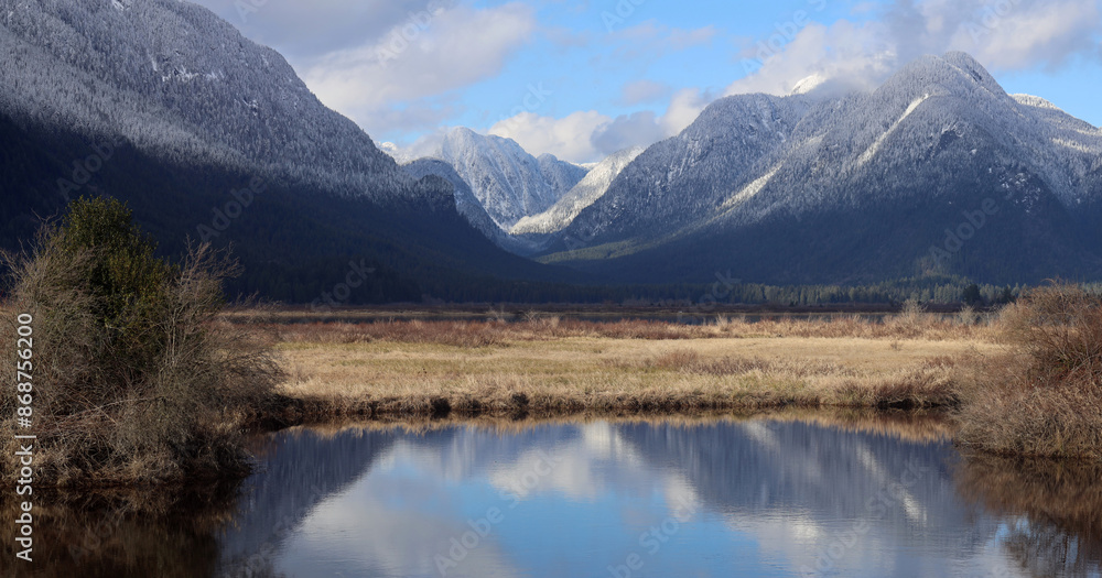 Perspective with first winter snow on valley mountains Perspective with first winter snow on valley mountains