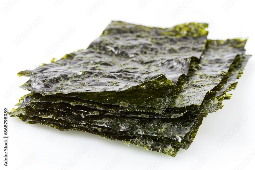 Several nori sheets on a white backdrop Several nori sheets on a white backdrop