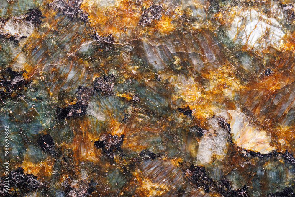 Closeup Macro Image of Surface of Dark Black Granite Stone Showing Natural Texture for Background Closeup Macro Image of Surface of Dark Black Granite Stone Showing Natural Texture for Background