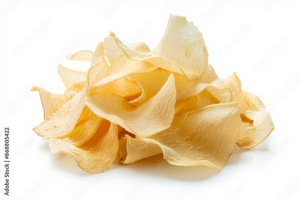Traditional Indonesian snack cassava chips isolated on white background Traditional Indonesian snack cassava chips isolated on white background