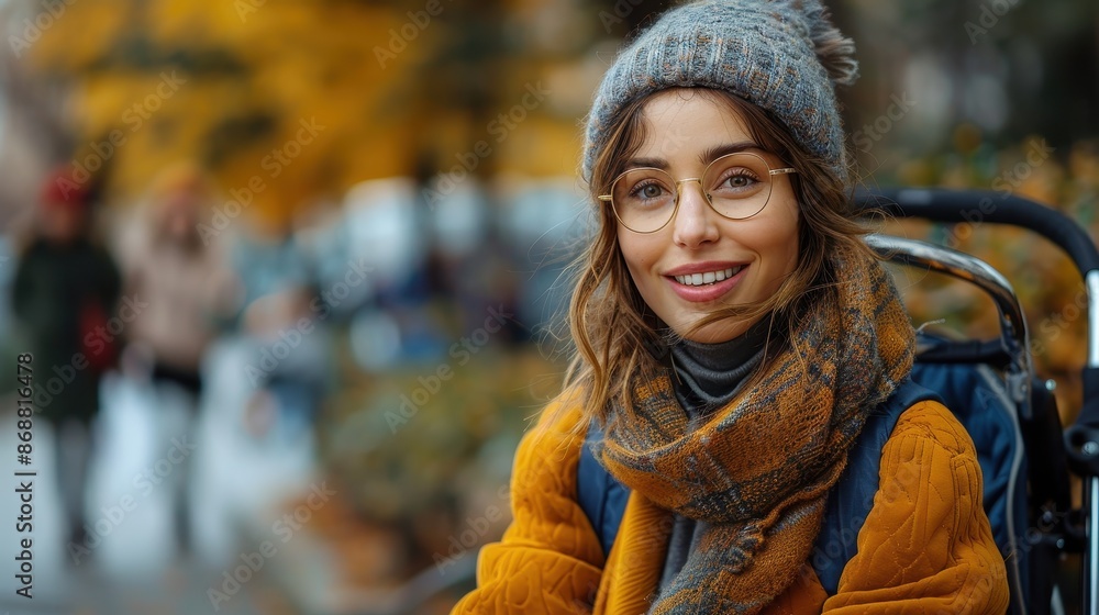 A young woman in a comfortable fall outfit, including a grey beanie and an orange jacket, smiles warmly at the camera with a background of autumn foliage and soft sunlight. A young woman in a comfortable fall outfit, including a grey beanie and an orange jacket, smiles warmly at the camera with a background of autumn foliage and soft sunlight.
