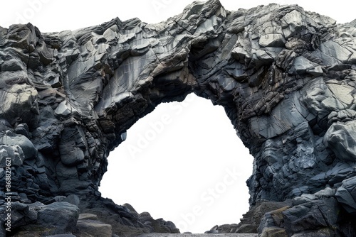 A large rock formation with a hole in the middle, suitable for use in landscape or nature-inspired designs photo