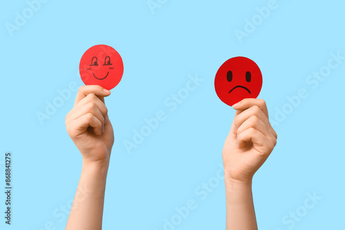 Woman with rating smiles on blue background. Customer experience concept