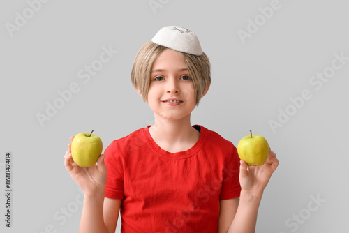 Cute little boy with apples...