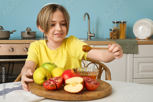 Cute little boy with ripe f...