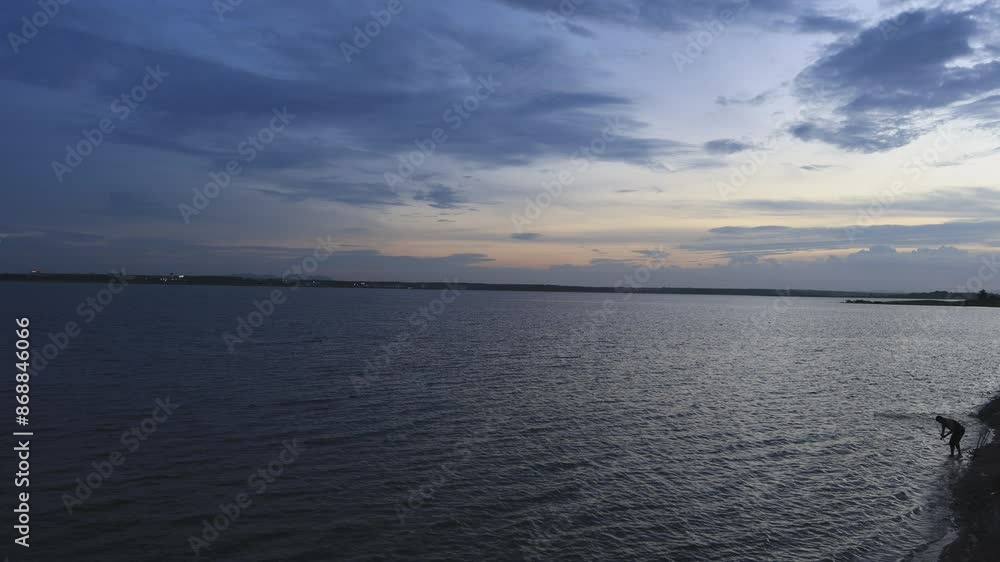 High angle video background with mountain scenery The river and the beautiful sunshine blurred onto the water surface in a golden light, the beauty of nature during the trip.