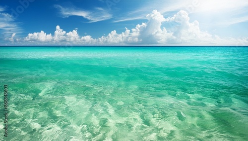 turquoise sea and blue sunny sky background