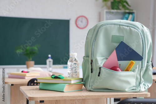 Backpack with books and bot...