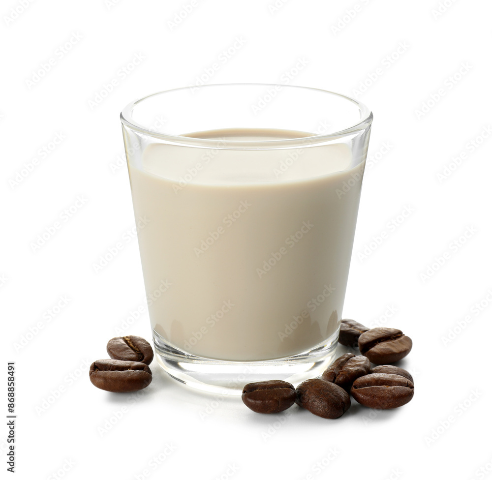 Glass of coffee cream liqueur and beans isolated on white Glass of coffee cream liqueur and beans isolated on white
