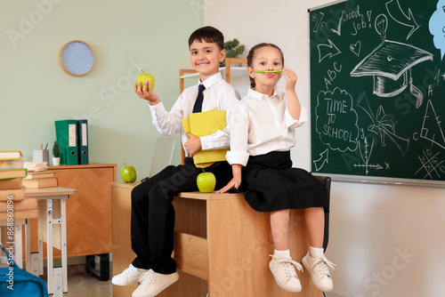 Little schoolchildren with ...