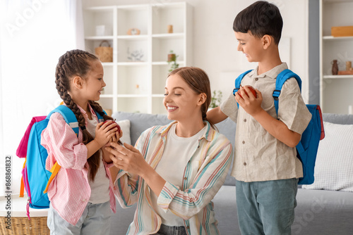 Little schoolchildren with ...