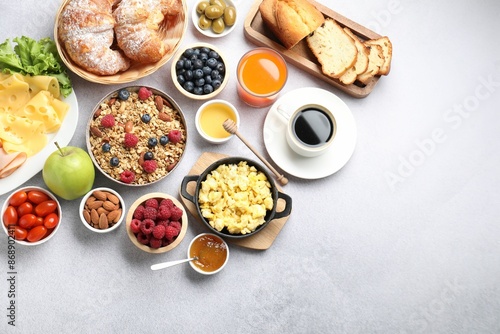 Wallpaper Mural Tasty breakfast. Flat lay composition with many different food and drinks on grey textured table. Space for text Torontodigital.ca