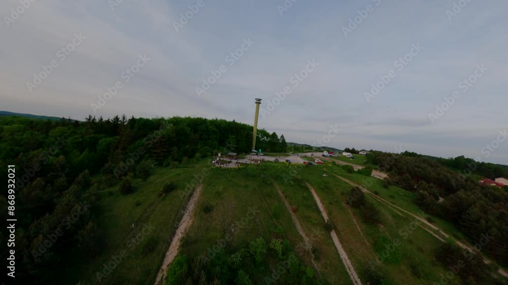 Aerial FPV orbit over observation tower and platform in Bledowska Desert, Poland Aerial FPV orbit over observation tower and platform in Bledowska Desert, Poland