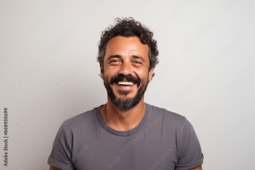 Portrait of a happy latin man smiling at the camera. Portrait of a happy latin man smiling at the camera.