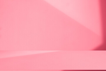 Wall interior background, studio and backdrops show products.with shadow from window color pink. background for text insertion and presentation product	