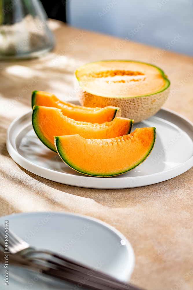 A sweet melon on a plate.
A melon or cantaloupe is a sweet fruit dessert.
A sweet melon on a plate.
A melon or cantaloupe is a sweet fruit dessert.