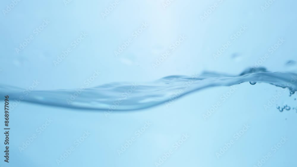 Fluid Dynamics Macro View of Fresh Water Droplets in Motion Nature's Symphony Slow-Motion Water Ripple Effect in Blue Hue. Fluid Dynamics Macro View of Fresh Water Droplets in Motion Nature's Symphony Slow-Motion Water Ripple Effect in Blue Hue.