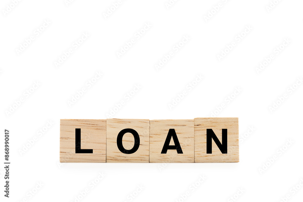 LOAN word wooden blocks isolated on white background. copy space and clipping path. Real estate market and finance concept. LOAN word wooden blocks isolated on white background. copy space and clipping path. Real estate market and finance concept.