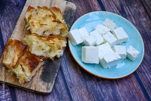 Bakery .Home made  cheese pie  with phyllo pastry and organic eggs. Bulgarian banitsa photo