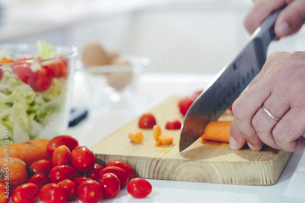 Chef at home using a knife cutting fresh raw vegetables. Cooker at home making a healthy vegetable meal, cutting up veggies - food and drink 4k footage - One man preparing salads in the kitchen Chef at home using a knife cutting fresh raw vegetables. Cooker at home making a healthy vegetable meal, cutting up veggies - food and drink 4k footage - One man preparing salads in the kitchen