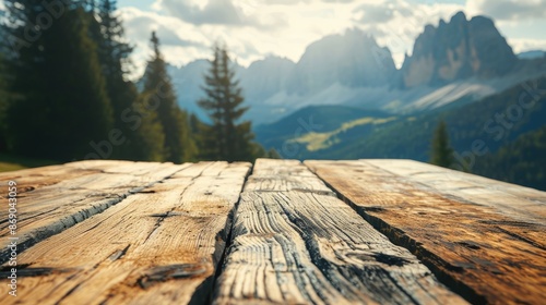 The close up picture of the empty table that has been made from the wood material and placed in front mountain, the mountain is the platform of land that rise from the ground to form the hill. AIGX02. photo