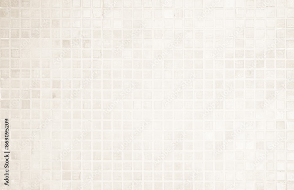 Cream light ceramic wall and floor tiles mosaic background in bathroom