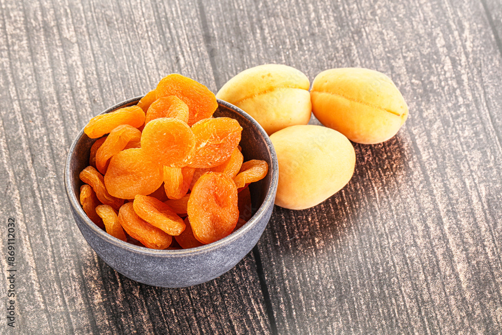 Dried apricot heap in the bowl Dried apricot heap in the bowl