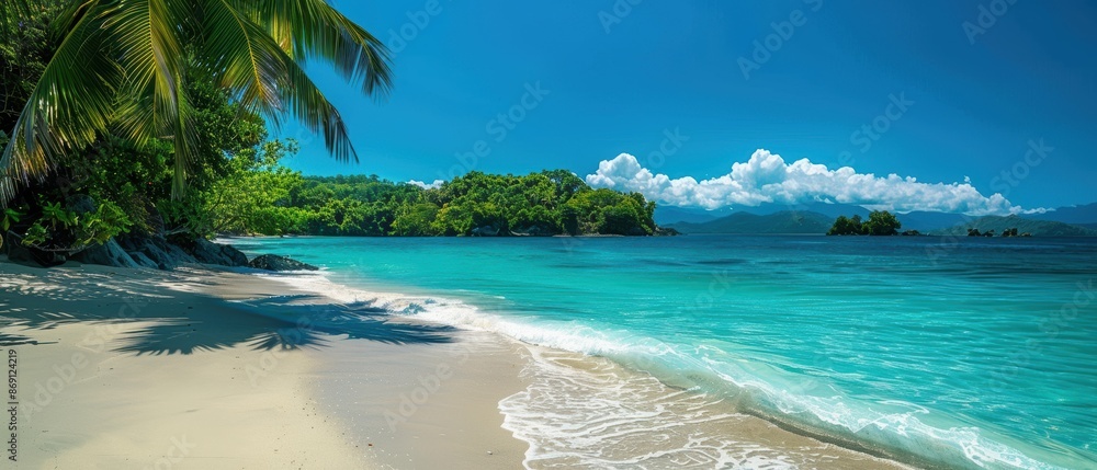 Fototapeta premium Tranquil Paradise: Stunning Scenic View of a Tropical Summer Beach with Turquoise Waters