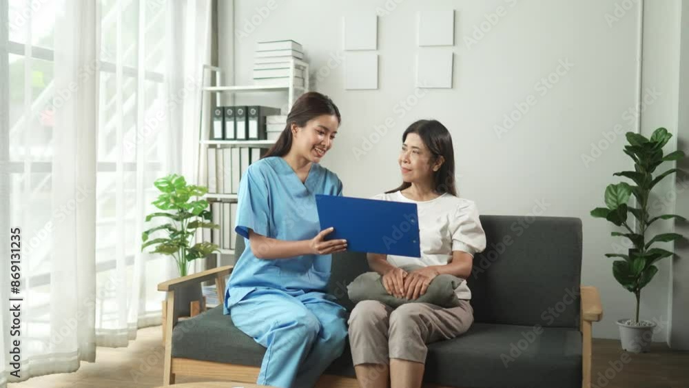 Healthcare worker explains medical report to patient in modern, well-lit room with large windows and green plants Healthcare worker explains medical report to patient in modern, well-lit room with large windows and green plants