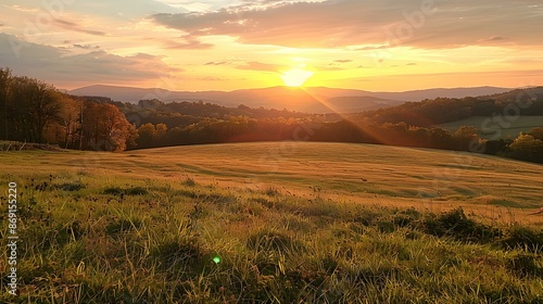 Sunset over a rural field © Adobe Contributor